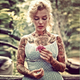 Illustration for article titled What famous celebrities would look like if they had tattoos